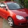 Volkswagen VW Polo 9N3 Comfortline Modelljahr 2006 mit der Motorisierung 1.4L 16V - 74 kW (100 PS) in der Farbe Sunset Red Metallic vom Mitglied delias aus Riede b. Bremen