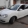 Volkswagen VW Polo 9N3  Modelljahr 2006 mit der Motorisierung 1.2L 6V - 40 kW (55 PS) in der Farbe weiß (Farbcode B4B4) vom Mitglied heinz
